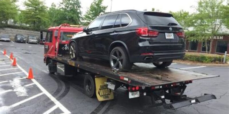 Star Tow Truck And Junk Cars